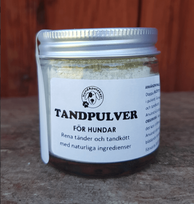 Tandpulver för hundar, för en bild på en burk med vitt pulver, rengör tänderna, naturligt. 